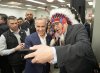 Pimicikamak Cree Nation Chief David Monias gets a selfie with Mark Carney at a federal election campaign rally in Winnipeg, Tuesday, April 1, 2025. THE CANADIAN PRESS/Adrian Wyld