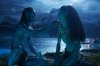 This image released by Disney shows Lo'ak, performed by Britain Dalton, left, and Tsireya, performed by Bailey Bass in a scene from 