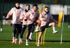 Aston Villa's Emi Buendia, Ollie Watkins and Matty Cash during a training session at Bodymoor Heath Training Ground, in Tamworth, England, Wednesday Dec. 10, 2025. (Jacob King/PA via AP)