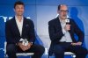 New Vancouver Whitecaps player Thomas Muller, left, listens as Whitecaps CEO and sporting director Axel Schuster speaks at a news conference in Vancouver, on Thursday, Aug. 14, 2025. THE CANADIAN PRESS/Darryl Dyck