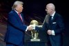 FILE - FIFA President Gianni Infantino, right, awards President Donald Trump with the FIFA Peace Prize during the draw for the 2026 soccer World Cup at the Kennedy Center in Washington, Friday, Dec. 5, 2025. (AP Photo/Chris Carlson, File)