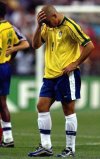FILE — In this July 12, 1998, file photo, Ronaldo, of Brazil, reacts shortly after the final whistle of the final of the soccer World Cup 98 between Brazil and France at the Stade de France in Saint Denis, north of Paris. Ronaldo said on Monday, Feb. 14, 2011, he is retiring from soccer because he can't stay fit any more, ending a stellar 18-year career in which he thrived with Brazil and some of Europe's top clubs. (AP Photo/Ricardo Mazalan, file)