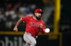 FILE - Los Angeles Angels' Anthony Rendon sprints to third during a baseball game against the Texas Rangers, Sept. 6, 2024, in Arlington, Texas. (AP Photo/Tony Gutierrez, File)