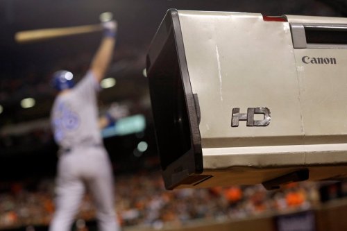 FILE - In this April 12, 2014 file photo, a television camera stands near the Toronto Blue Jays' on deck circle during a baseball game between the Blue Jays and the Baltimore Orioles in Baltimore. (AP Photo/Patrick Semansky, File)