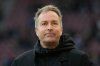 Leverkusen's head coach Kasper Hjulmand arrives for the Bundesliga soccer match between FC Augsburg and Bayer Leverkusen in Augsburg, Germany, Dec. 6, 2025. (AP Photo/Matthias Schrader)