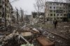 In this photo taken on Saturday Dec. 20, 2025 and provided by Ukraine's 24th Mechanized Brigade press service, a soldier walks through the ruins of the town of Kostyantynivka, in the Donetsk region, Ukraine. (Oleg Petrasiuk/Ukraine's 24th Mechanized Brigade via AP)