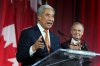 Michael Ma, member of Parliament for Markham-Unionville, makes brief remarks alongside Prime Minister Mark Carney at the Liberal caucus holiday party in Ottawa on Thursday, Dec. 11, 2025. THE CANADIAN PRESS/Justin Tang