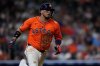 FILE - Houston Astros' Isaac Paredes runs to first after hitting a single during the seventh inning of a baseball game against the Texas Rangers, July 11, 2025, in Houston. (AP Photo/Kevin M. Cox, File)