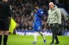 Chelsea's Jamie Gittens walks off the pitch after getting injured during the English Premier League soccer match between Chelsea and West Ham United in London, Saturday, Jan. 31, 2026. (AP Photo/Alastair Grant)
