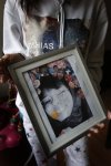 Christie Zebrasky hold a photo of her daughter Eishia Hudson in Winnipeg on Friday, Dec. 11, 2020. Hudson was fatally shot by police on April 8, 2020. THE CANADIAN PRESS/John Woods