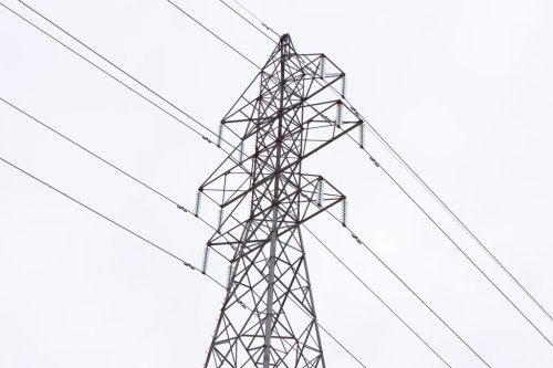 High voltage power lines are seen in Beauharnois, Que., on Monday, Jan. 27, 2025. THE CANADIAN PRESS/Christinne Muschi