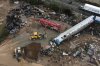 FILE - Rescuers at the site of a train collision in Tempe, about 376 kilometres (235 miles) north of Athens, near Larissa city, Greece, Friday, March 3, 2023. (AP Photo/Giannis Papanikos, File)