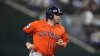 FILE - Houston Astros' Victor Caratini sprints to third during a baseball game against the Texas Rangers in Arlington, Texas., Sept. 6, 2025. (AP Photo/Tony Gutierrez, File)