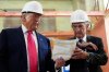 FILE - Federal Reserve Chairman Jerome Powell, right, and President Donald Trump look over a document of cost figures during a visit to the Federal Reserve, Thursday, July 24, 2025, in Washington. (AP Photo/Julia Demaree Nikhinson, File)