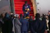 Senegal's Kalidou Koulibaly holds the Africa Cup of Nations trophy as he deplanes following their victory in the Africa Cup of Nations soccer tournament, in Ndiass, Senegal, Tuesday, Jan. 20, 2026. (AP Photo/Misper Apawu)