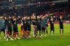 Bayern players greet fans at the end of the German Bundesliga soccer match between 1.FC Koeln and FC Bayern Munich in Cologne, Germany, Wednesday, Jan. 14, 2026. (AP Photo/Martin Meissner)
