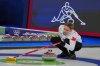 Canada's Jocelyn Peterman in action during the mixed doubles round-robin phase of the curling competition against Norway at the 2026 Winter Olympics in Cortina d'Ampezzo, Italy on Feb. 5, 2026. (AP Photo/Misper Apawu)