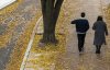 A couple walk among the fall leaves in downtown Vancouver, B.C.,Thursday, Nov. 24, 2022. THE CANADIAN PRESS/Jonathan Hayward