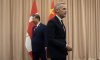 Prime Minister Mark Carney, right, and Chinese President Xi Jinping make their way to their seats after shaking hands at the start of a meeting in Gyeongju on Friday, Oct. 31, 2025. THE CANADIAN PRESS/Adrian Wyld