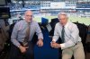 Sportsnet sportscasters Dan Shulman (left) and Buck Martinez sit in the commentary booth ahead of Game 7 World Series MLB baseball action between the Toronto Blue Jays and Los Angeles Dodgers in Toronto on Saturday, November 1, 2025. THE CANADIAN PRESS/Chris Young
