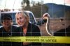 Karen Espersen, centre, the co-owner of Universal Ostrich Farms, speaks with supporters with her daughter, Katie Pasitney, at the farm in Edgewood, B.C., on Monday, Sept. 22, 2025. THE CANADIAN PRESS/Aaron Hemens