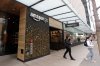 FILE - People walk out of an Amazon Go store in Seattle, March 4, 2020. (AP Photo/Ted S. Warren, File)