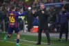 Barcelona's Fermin Lopez celebrates with head coach Hansi Flick after scoring his side's second goal during the Champions League opening phase soccer match between Slavia Prague and Barcelona in Prague, Czech Republic, Wednesday, Jan. 21, 2026. (AP Photo/Petr David Josek)