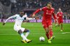 Liverpool's Virgil van Dijk kicks the ball ahead of Marseille's Timothy Weah, left, during the Champions League opening phase soccer match between Marseille and Liverpool in Marseille, France, Wednesday, Jan. 21, 2026. (AP Photo/Philippe Magoni)