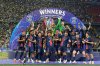 FILE - PSG's Marquinhos holds up the trophy as he celebrates with his teammates after winning the Champions League final soccer match between Paris Saint-Germain and Inter Milan at the Allianz Arena in Munich, Germany, Saturday, May 31, 2025. (AP Photo/Martin Meissner, File)