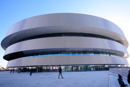 An outside view of the Santa Giulia Ice Hockey Arena, in Milan, where Ice Hockey discipline of the Milan Cortina 2026 Winter Olympics will take place, in Milan, Italy, Sunday, Jan. 11, 2026. (AP Photo/Luca Bruno)