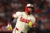 FILE - Los Angeles Angels designated hitter Yoán Moncada runs to first base after hitting a double during the seventh inning of a baseball game agains the Kansas City Royals, Sept. 24, 2025, in Anaheim, Calif. (AP Photo/Jessie Alcheh, File)