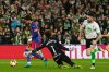 Barcelona's Ferran Torres, left, scores the opening goal during the Copa del Rey round of 16 soccer match between Racing Santander and Barcelona, in Santander, Spain, Thursday, Jan. 15, 2026. (AP Photo/Miguel Oses)