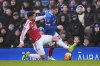 Arsenal's Ethan Nwaneri tackles Portsmouth's Zak Swanson during the FA Cup third round soccer match between Portsmouth and Arsenal in Portsmouth, England, Sunday, Jan. 11, 2026. (AP Photo/Kin Cheung)