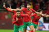 Morocco players celebrate after winning after a penalty shootout during the Africa Cup of Nations semi-final match between Nigeria and Morocco in Rabat, Morocco, Wednesday, Jan. 14, 2026. (AP Photo/Mosa'ab Elshamy)