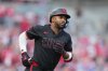 FILE - Cincinnati Reds' Miguel Andujar celebrates as he rounds the bases after hitting a solo home run during the first inning of a baseball game against the Chicago Cubs, Sept. 19, 2025, in Cincinnati. (AP Photo/Jeff Dean, File)
