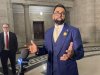 Obby Khan speaks to reporters after being sworn in as a member of the Manitoba legislature in Winnipeg, Monday, April 4, 2022. THE CANADIAN PRESS/Steve Lambert