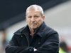 FILE - Coach of Montpellier Rolland Courbis reacts during the French League One soccer match Nice against Montpellier, Friday, Dec. 18, 2015, in Nice stadium, southeastern France. (AP Photo/Lionel Cironneau, file)