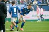 Schalke's Edin Dzeko, right, is substituted for Amin Younes during the 2. Bundesliga soccer match between FC Schalke 04 and 1. FC Kaiserslautern in Gelsenkirchen, Germany, Sunday Jan. 25, 2026. (Bernd Thissen/dpa via AP)