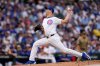 FILE - Chicago Cubs' Taylor Rogers throws during the eighth inning of Game 2 of a National League wild card baseball game against the San Diego Padres Wednesday, Oct. 1, 2025, in Chicago. (AP Photo/Erin Hooley,File)