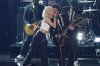 Rose, left, and Bruno Mars perfom 