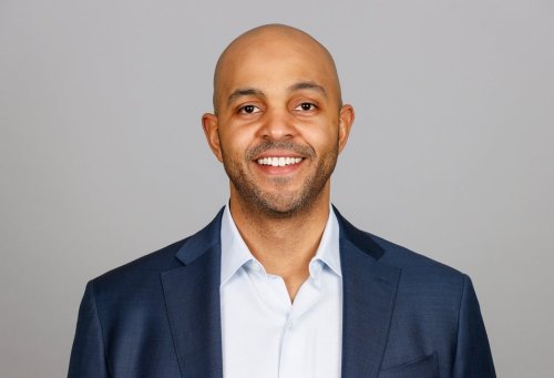 FILE - Chicago Bears assistant general manager Ian Cunningham poses for a photo April 28, 2022, in Lake Forest, Ill. (AP Photo, File)
