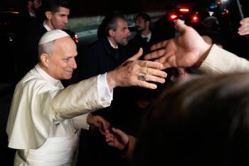 Gregorio Borgia / The Associated Press files
                                Pope Leo XIV greets the faithful as he leaves the Castel Gandolfo residence to head to the Vatican on Dec. 27, 2025.
