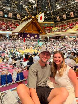 Taylor Allen and Janelle Yarjau take in the Grand Sumo Tournament in May at the Ryogoku Kokugikan Sumo Hall, in Tokyo.