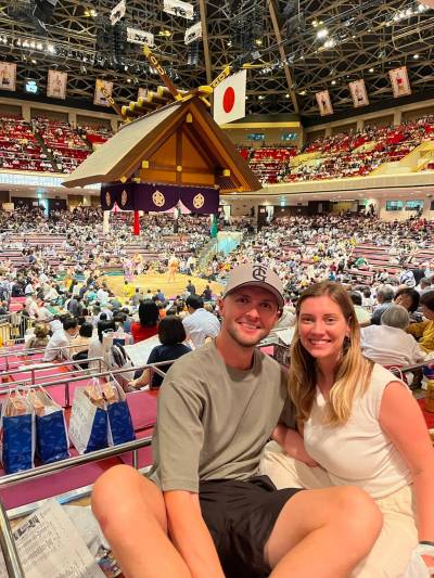 Taylor Allen and Janelle Yarjau take in the Grand Sumo Tournament in May at the Ryogoku Kokugikan Sumo Hall, in Tokyo.
