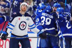 FRANK GUNN / THE CANADIAN PRESS
                                Jets&rsquo; forward Gabe Vilardi looks skyward Thursday as the Toronto Maple Leafs celebrate after scoring late in the third period.