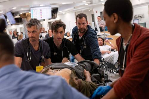 Bell Media
                                Noah Wyle (centre, back) stars as Dr. Michael (Robby) Robinavitch in The Pitt.