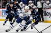 JOHN WOODS / THE CANADIAN PRESS
                                Winnipeg Jets&rsquo; Elias Salomonsson (57) defends against Toronto Maple Leafs&rsquo; Bobby McMann (74) as he breaks towards the net during the first period in Winnipeg on Saturday.