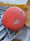 SUPPLIED
                                One of multiple marker balls damaged by shotgun pellets that were salvaged from a hydro line in Pimicikamak Cree Nation. The line broke, resulting in a long power outage. It has not been determined whether damage from gunshots was a factor in the outage.