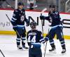Fred Greenslade / THE CANADIAN PRESS
                                Winnipeg Jets&rsquo; Mark Scheifele celebrates his goal against the St. Louis Blues with Kyle Connor and Josh Morrissey in the first period of the Jets 3-1 win in Winnipeg, Tuesday.