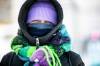 MIKAELA MACKENZIE / FREE PRESS
                                Susan Wieler smiles while walking on the river trail as temperatures dip. The weather will be less cold starting Monday, when a high of about -17 C is expected in Winnipeg.